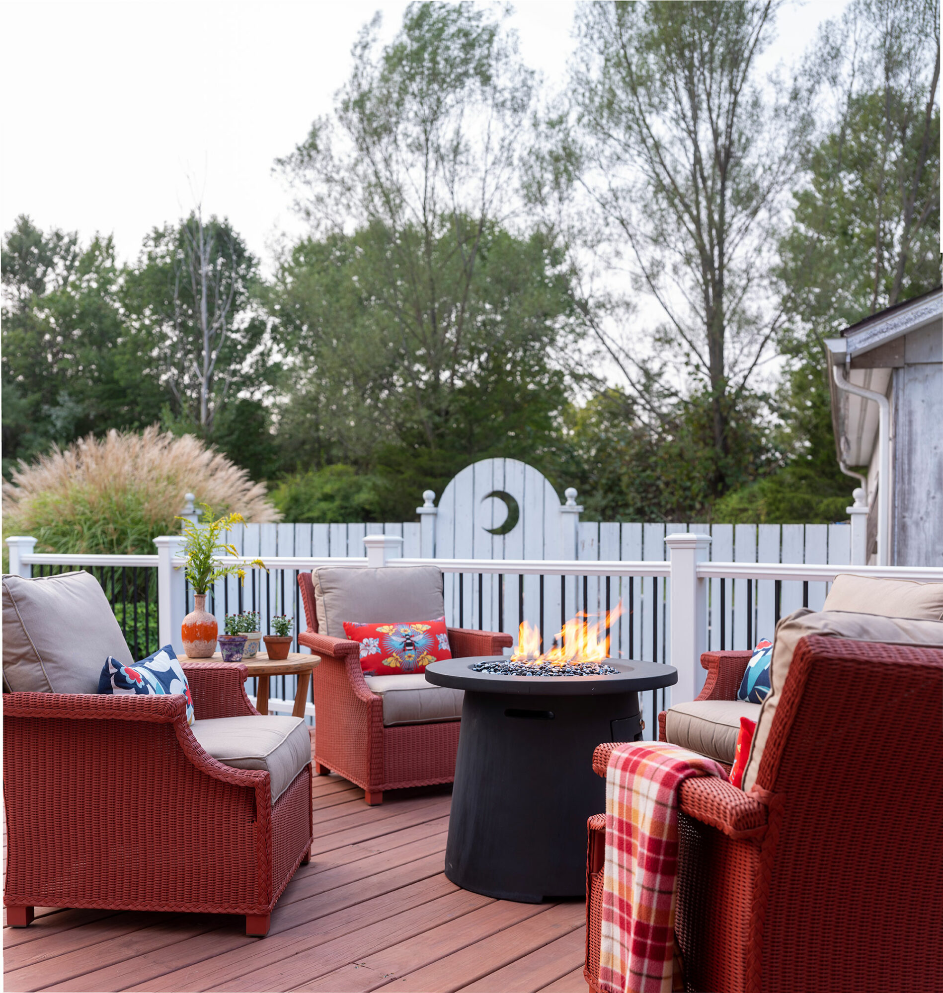 red outdoor oasis by lisa davenport with firepit