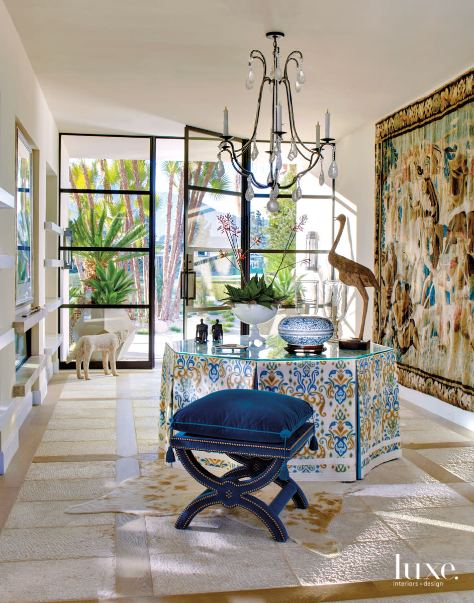 Rancho Mirage foyer with Flemish tapestries on the walls