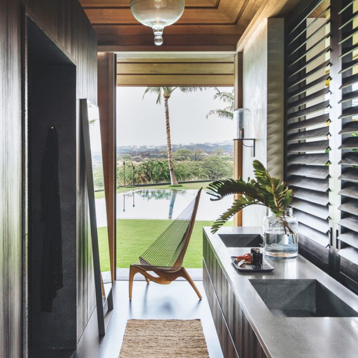 In this Hawaiian bathroom sanctuary, designer Nicole Hollis brought in color, textures and surfaces from the outside, giving the space a deep connection to the land.