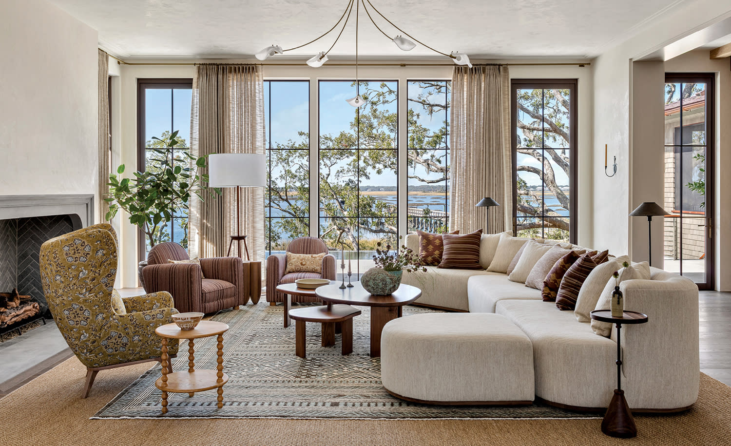 classic organic living room with a wingback chair and a shapely sectional