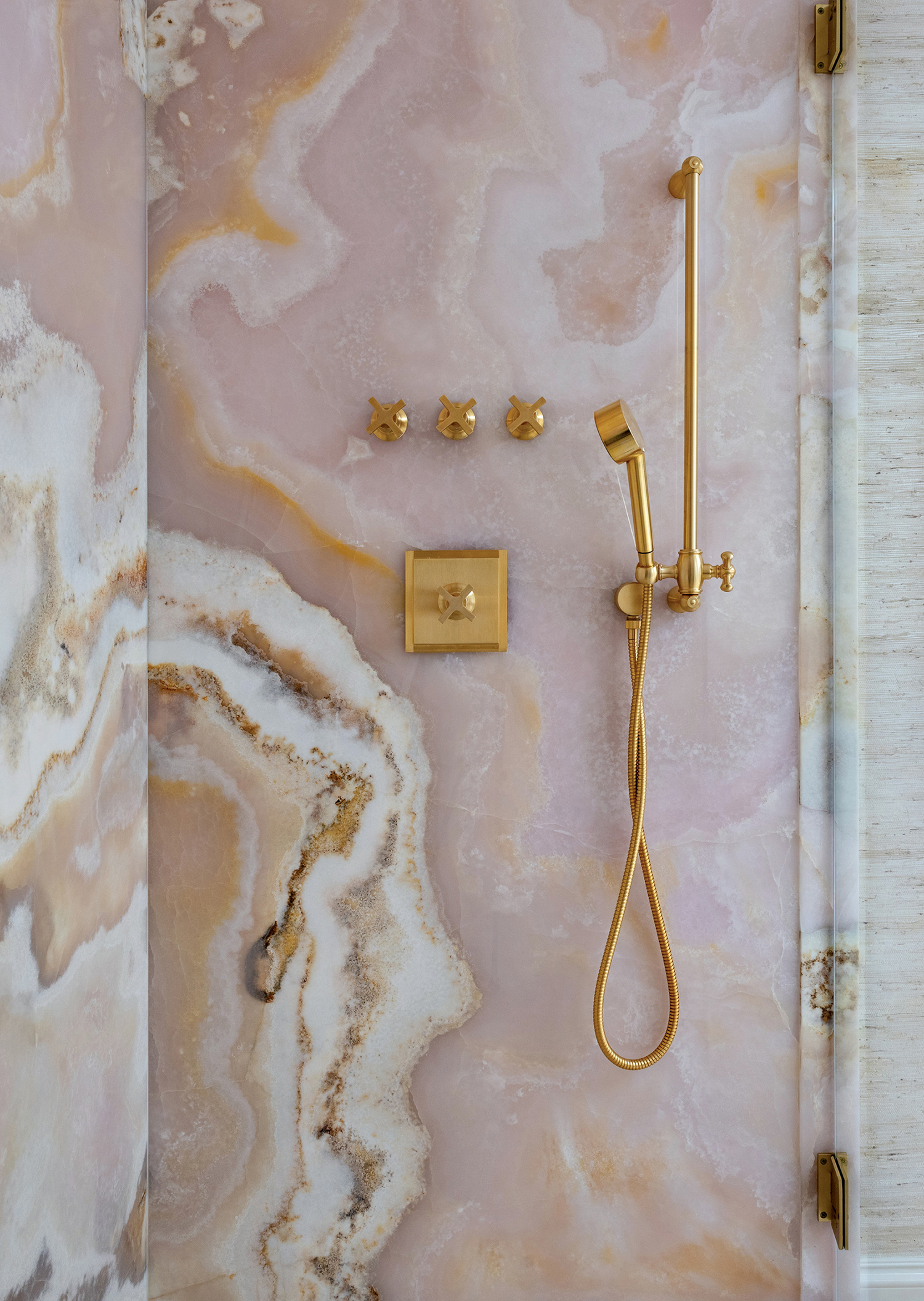 pink, brown and white stone shower wall