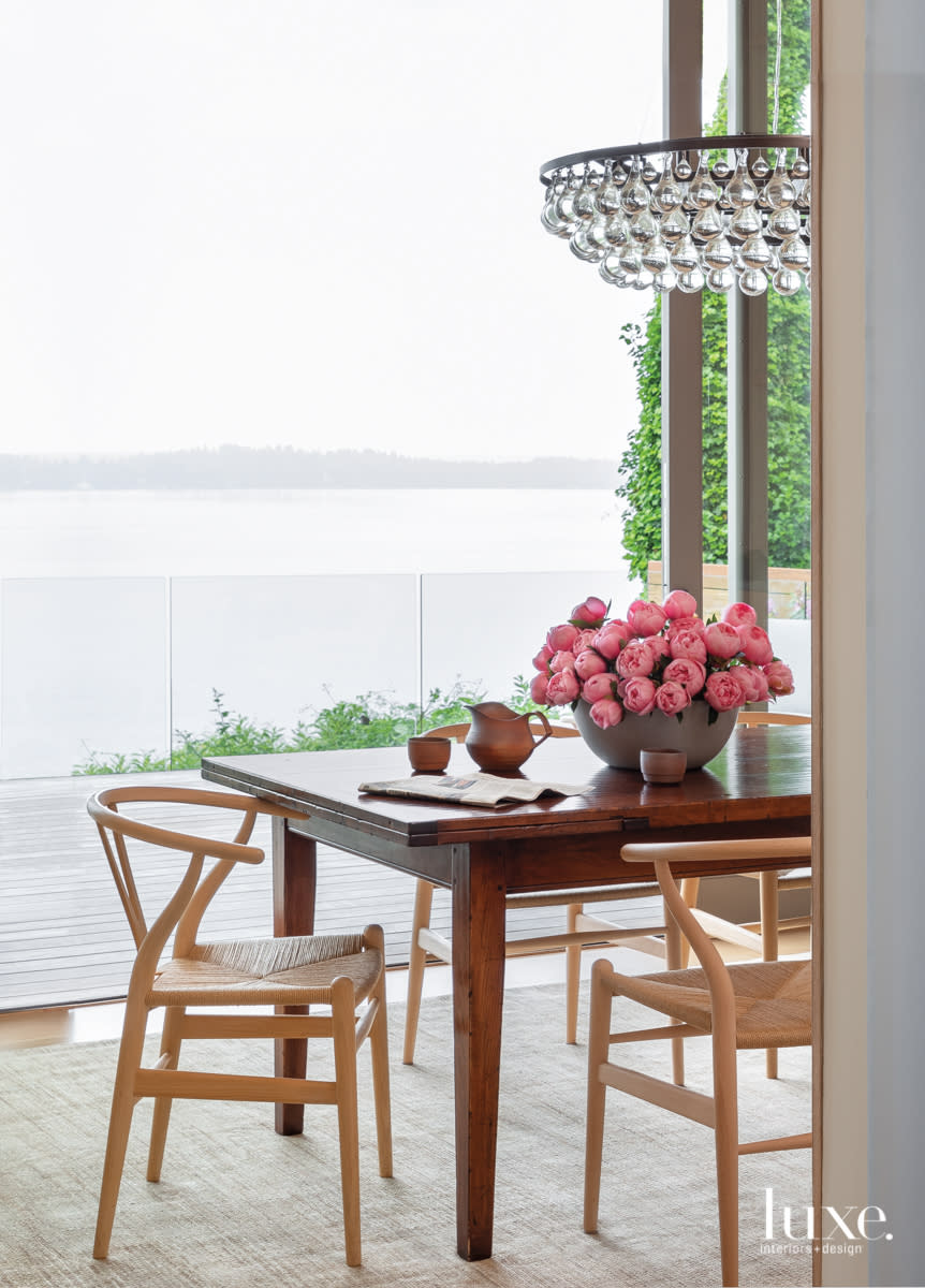 farmhouse table outside overlooking lake