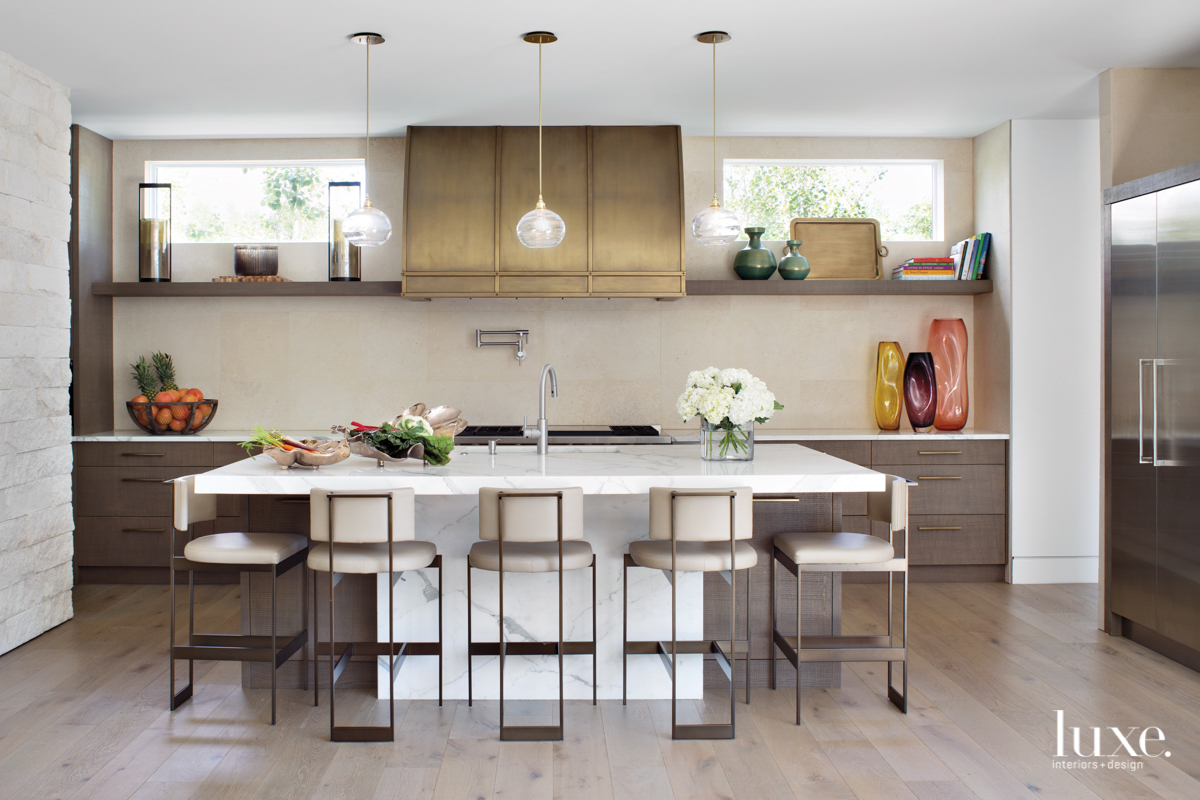 kitchen with scraped oak cabinets and marble countertops