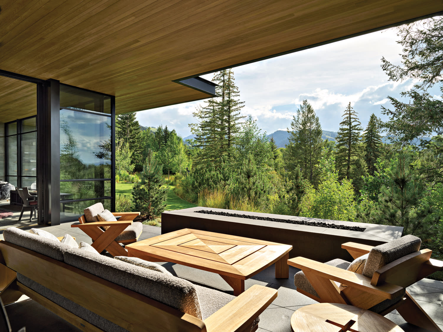 contemporary mountain home patio with views of the Colorado mountains