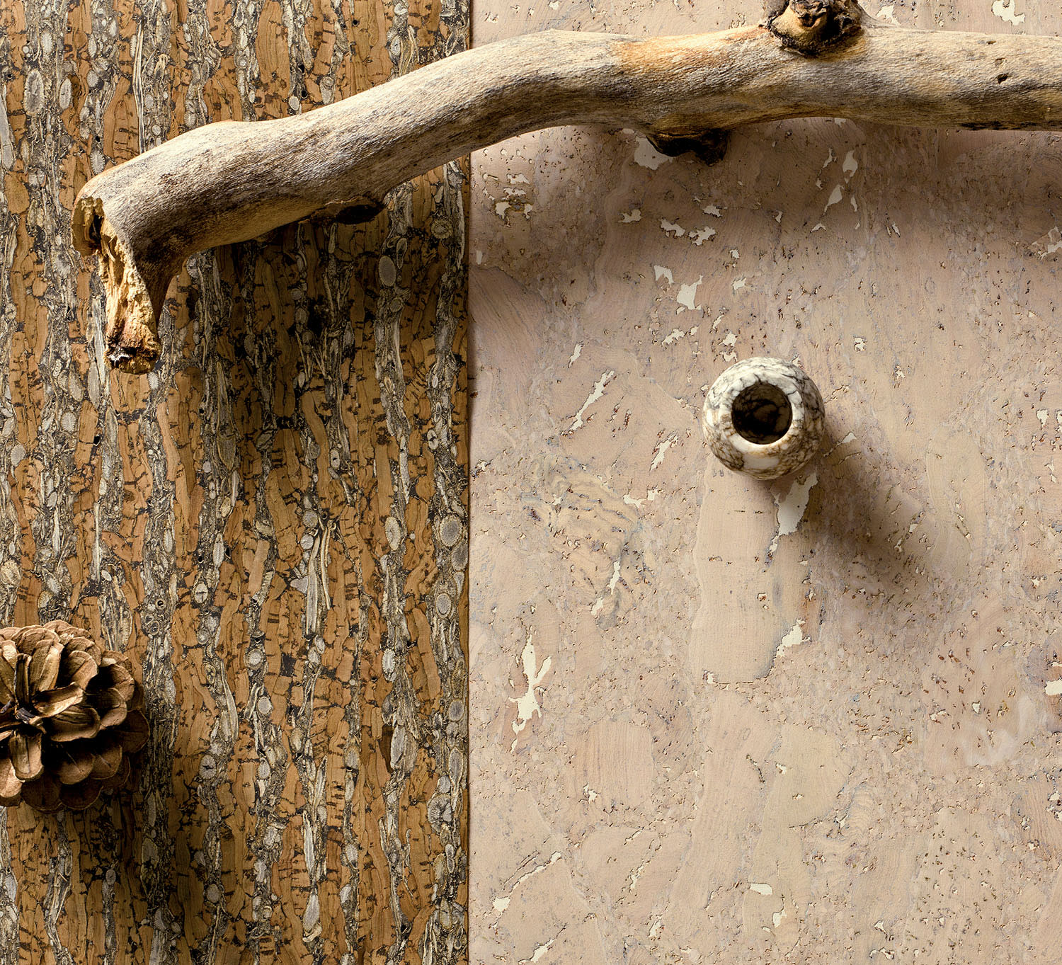 Wall coverings made of cork with two color schemes and patterns placed side-by-side.