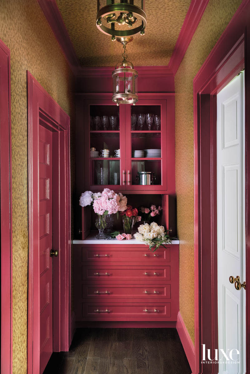 pink red wet bar in hallway