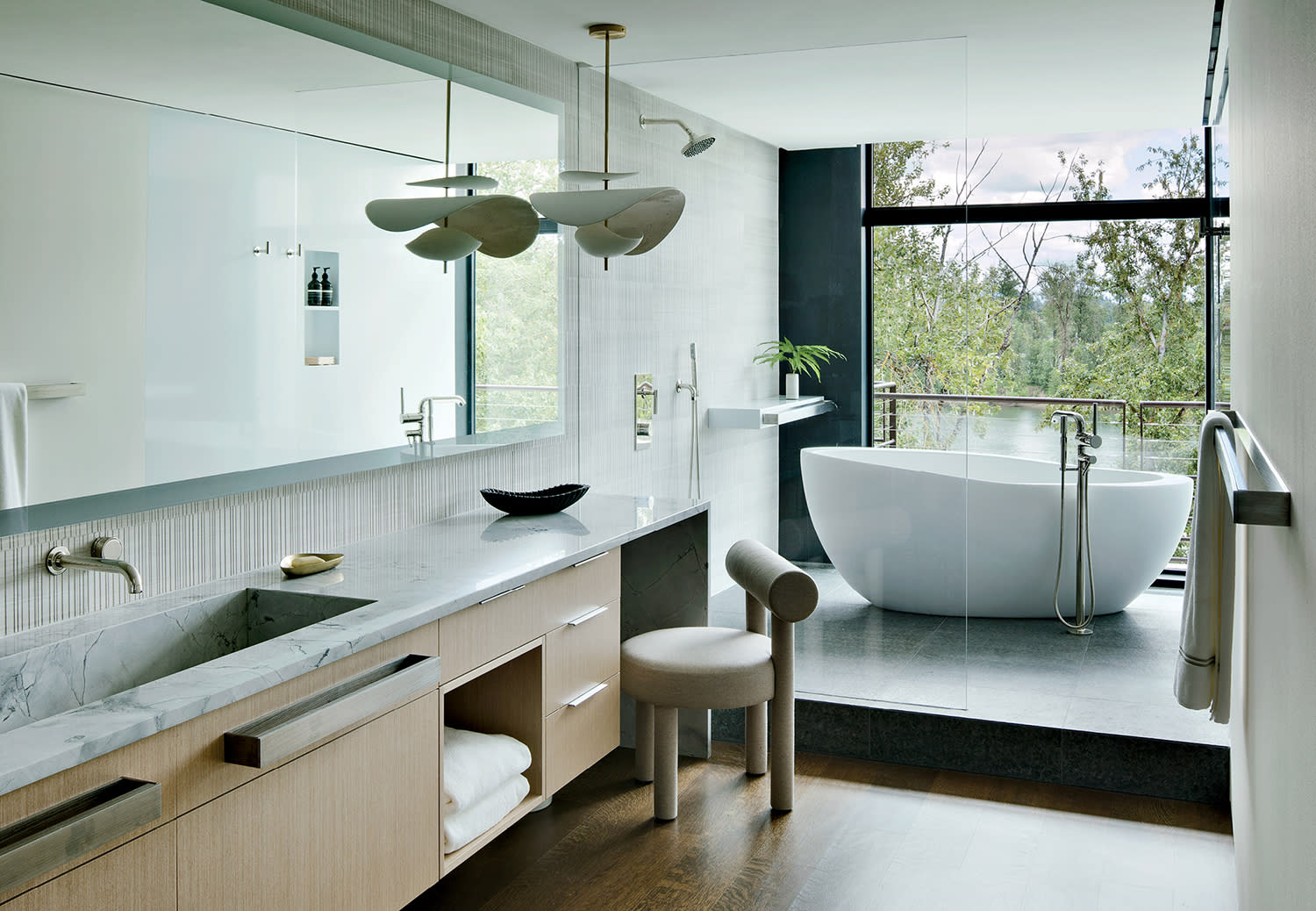 contemporary bathroom with views of the Willamette River outside