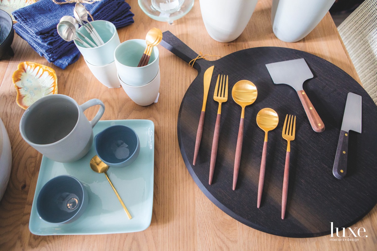 Flatware from Portugal and a walnut cutting board made by a woodworker in Philadelphia.