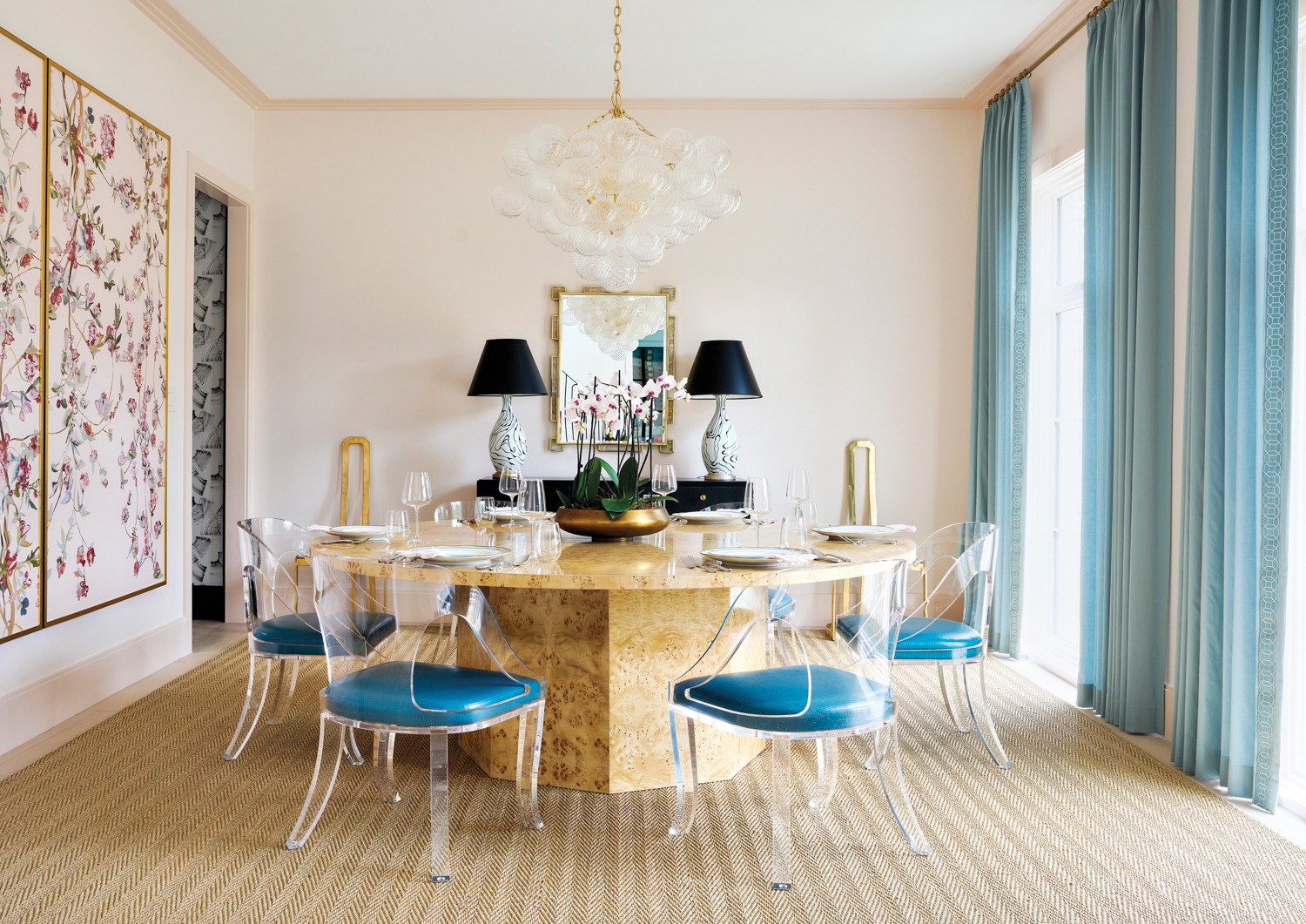 pink dining room with blue accents in home by Hallie Henley Sims