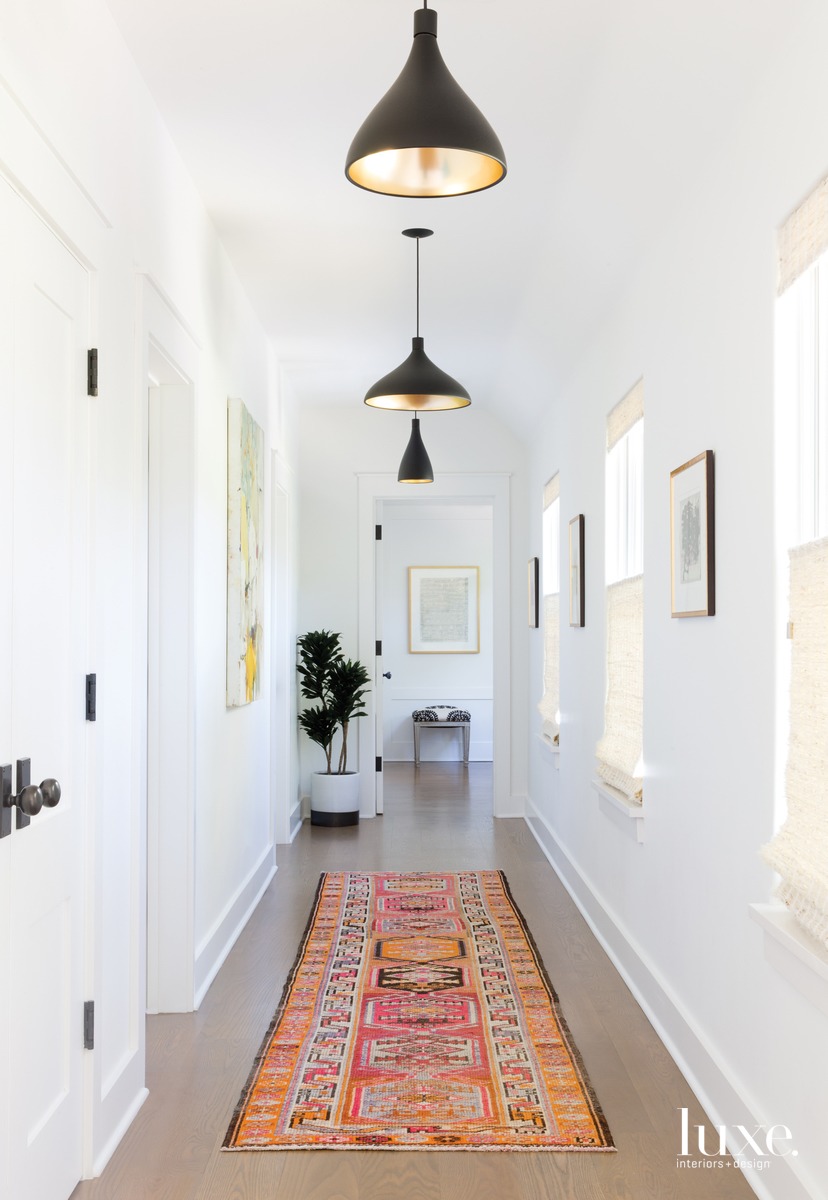 eclectic white hallway vintage orange rug