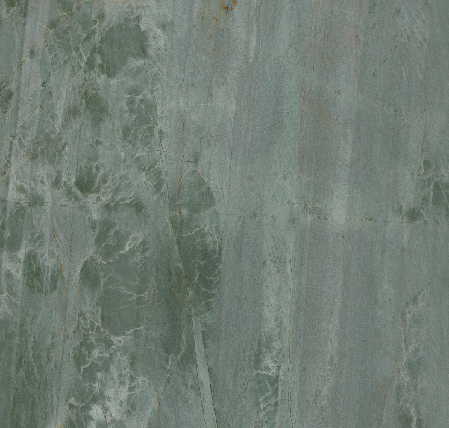 A slab of stone in a deep green color with rippling patterns.