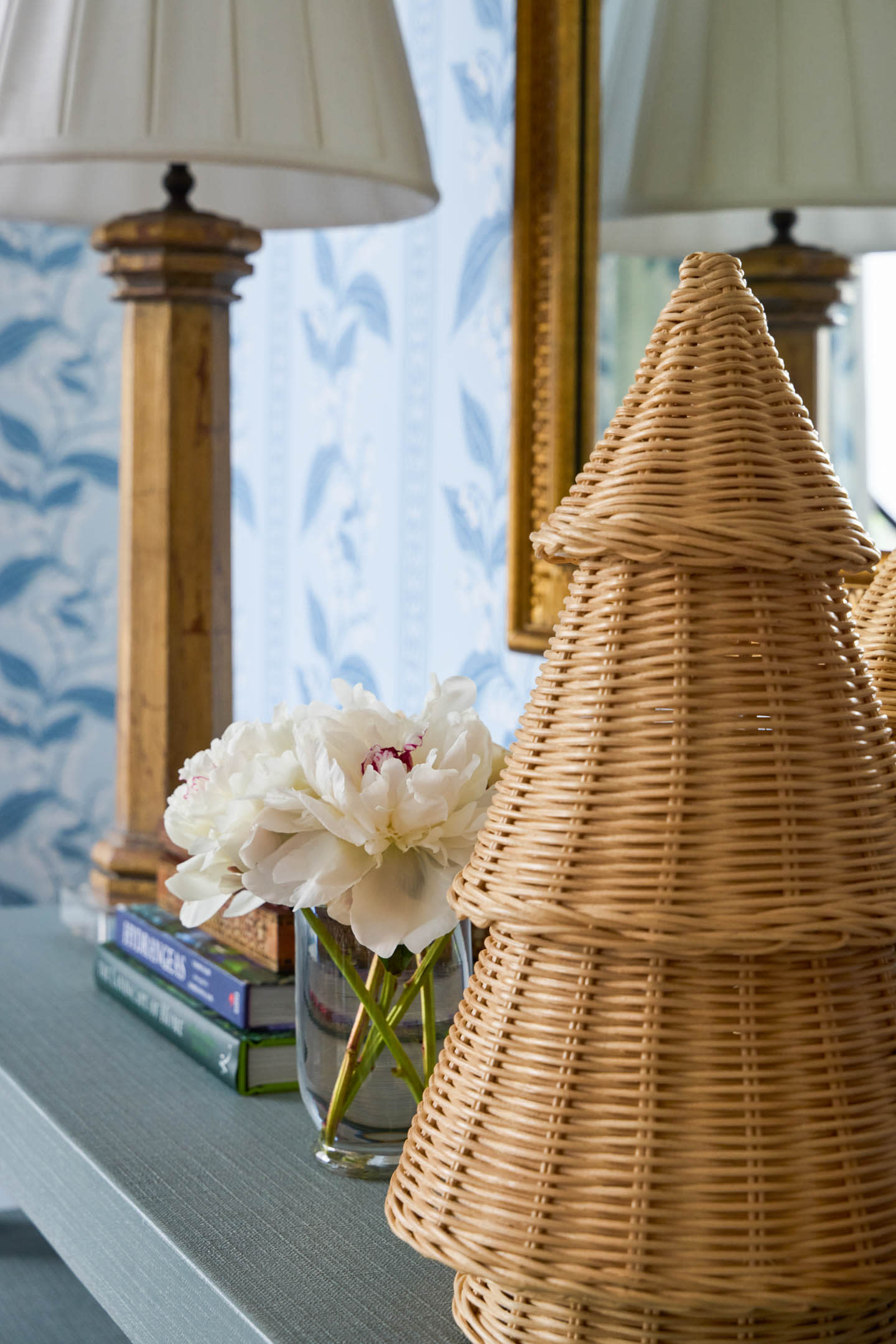 woven Christmas tree atop a shelf