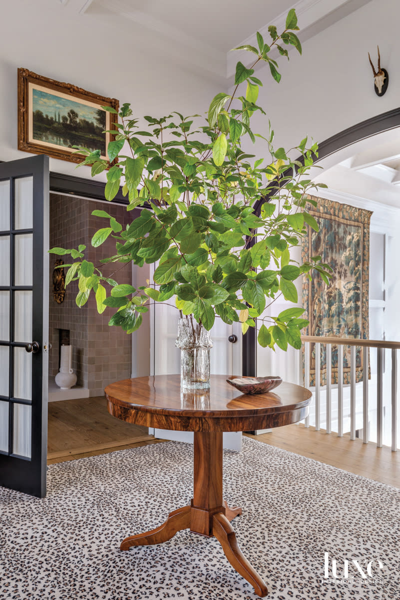 leopard rug pedestal table