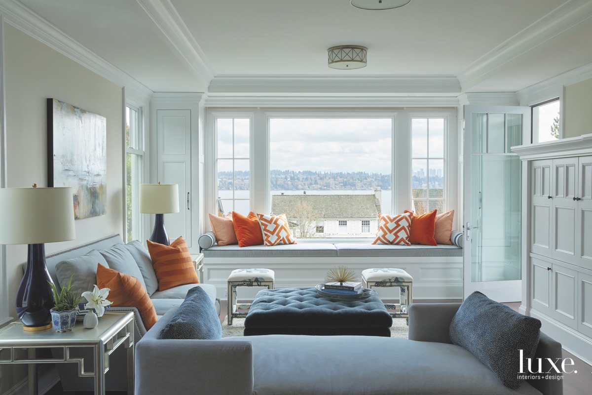 traditional family room window seat orange throw pillows