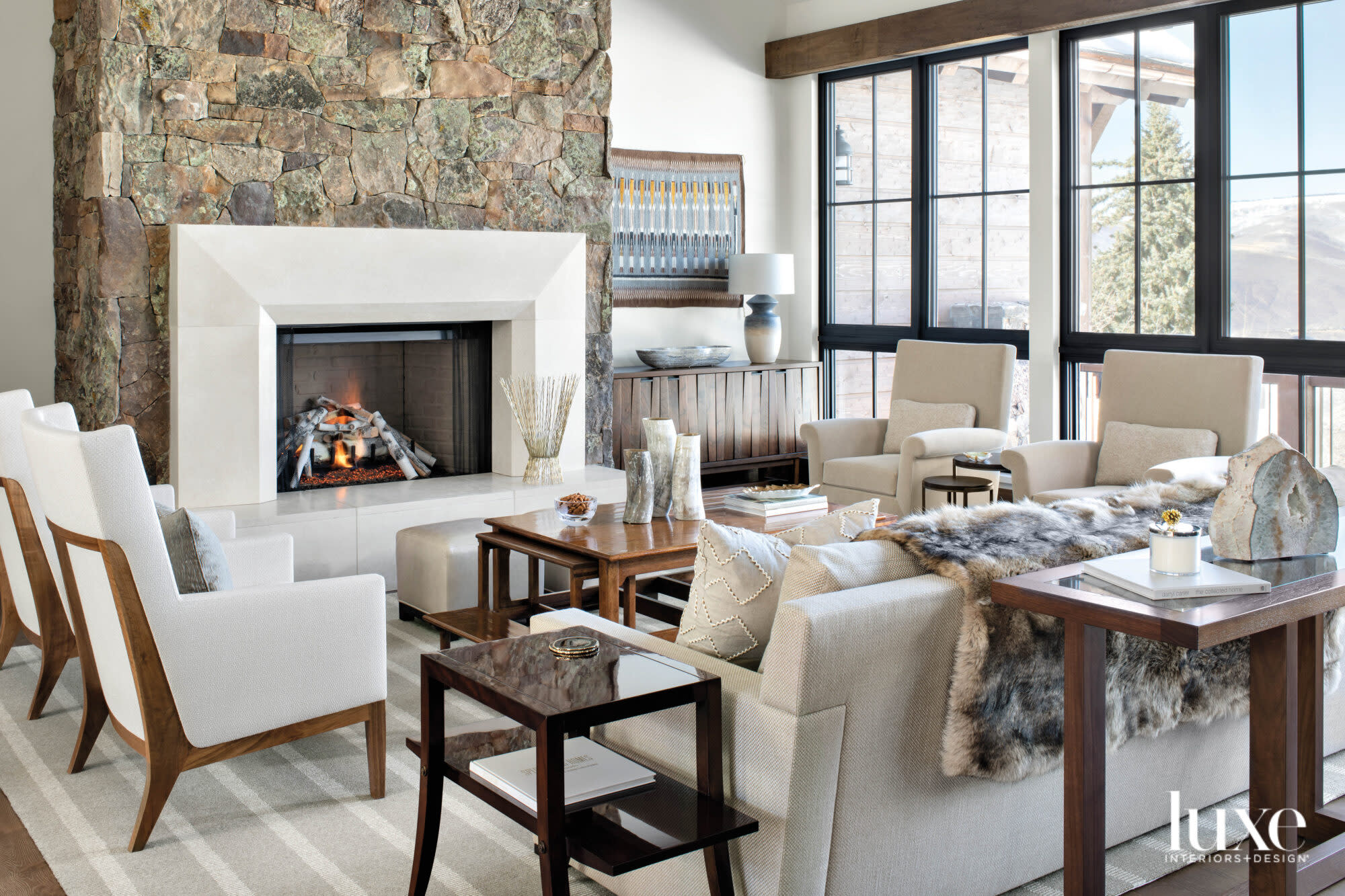 stone fireplace mountain house living room