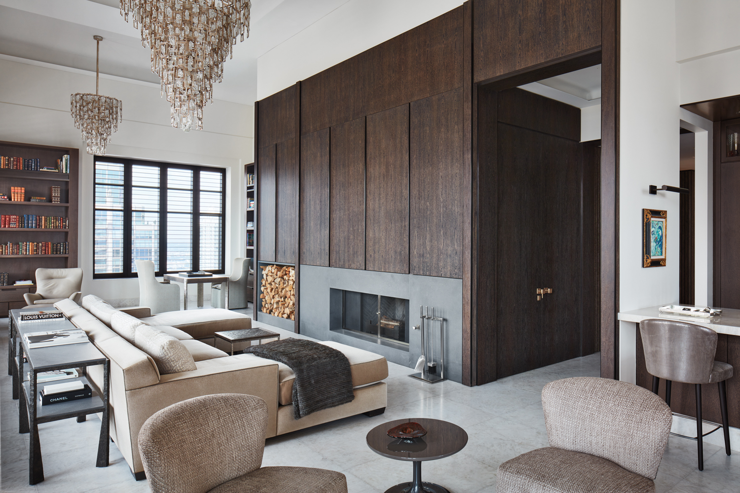 A living room with a wood-burning fireplace.