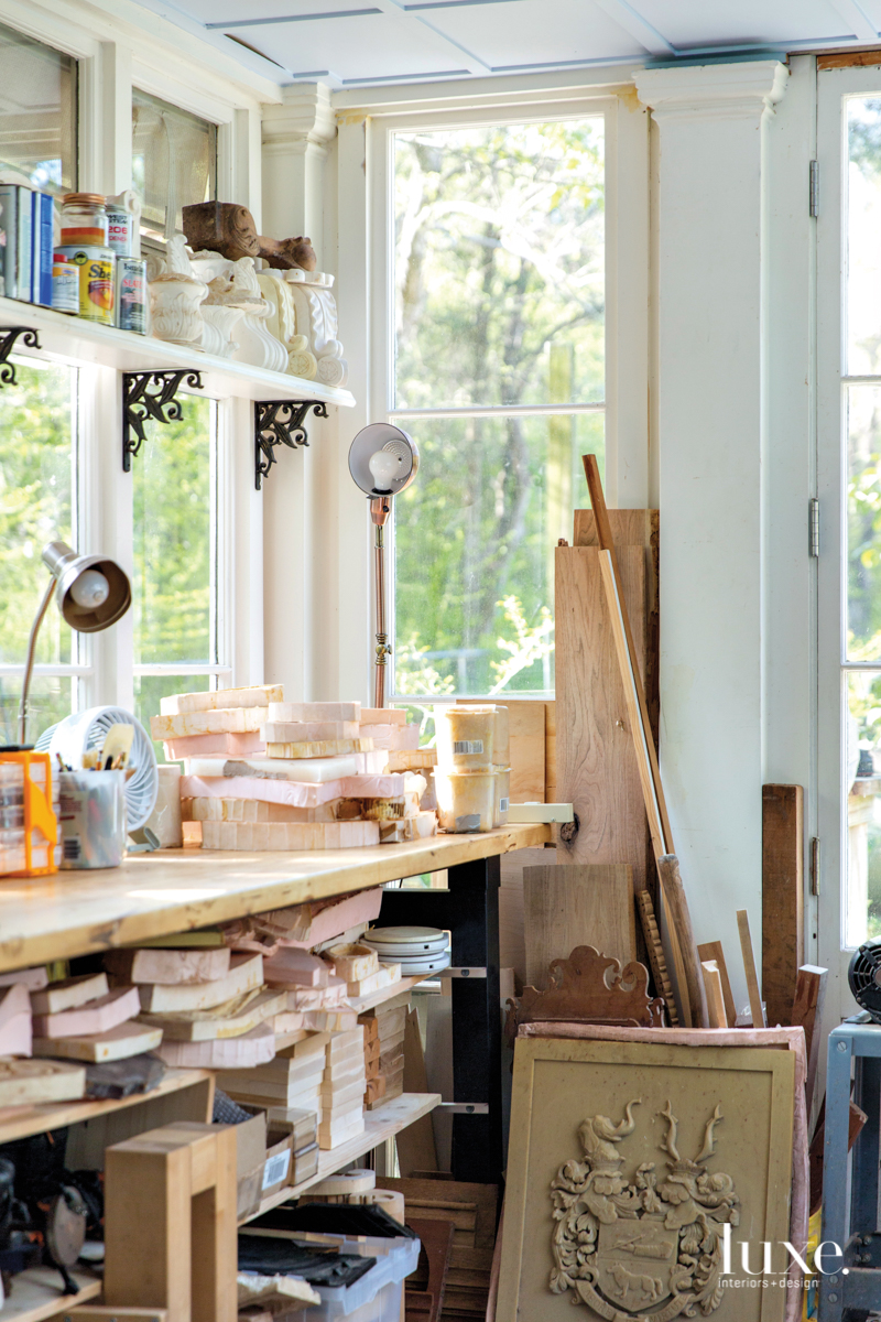 Sited among several oak-shrouded acres on the outskirts of Charleston, Mary May's creative space is ensconced in a white-clapboard cottage hand-built by her husband.