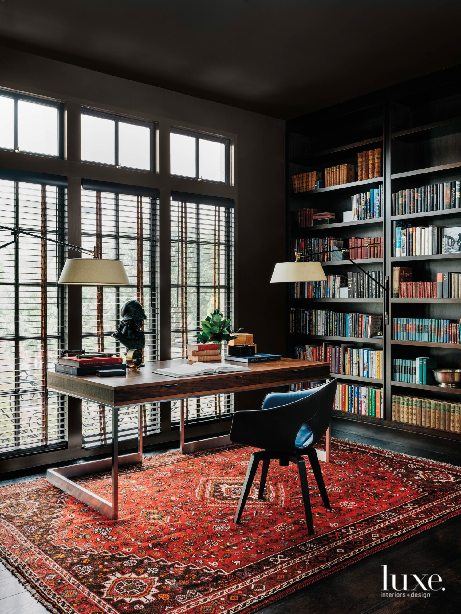 The library is painted in dark blue tones