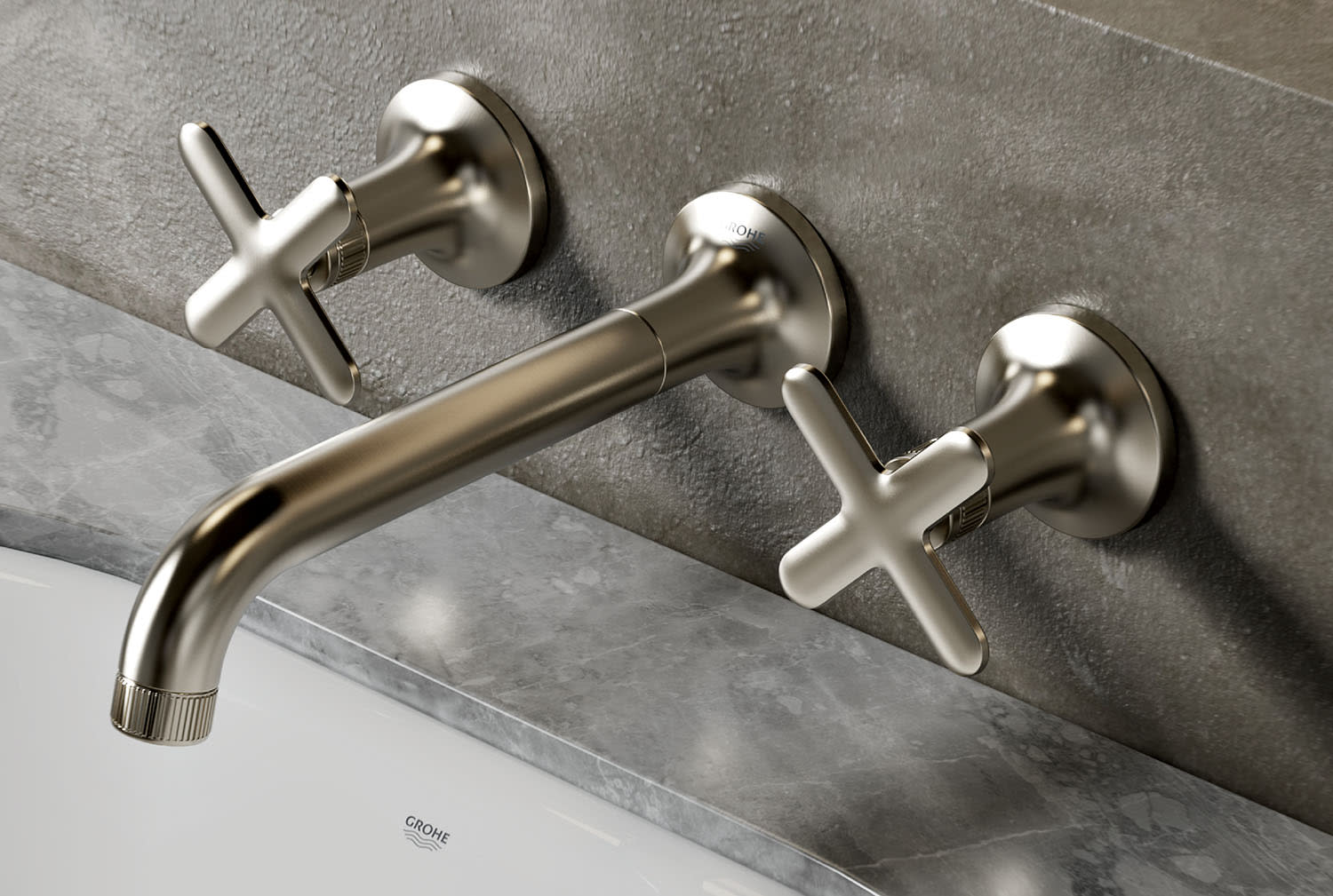 A bathtub with stone exterior and silver faucet with hot and cold taps on either side.
