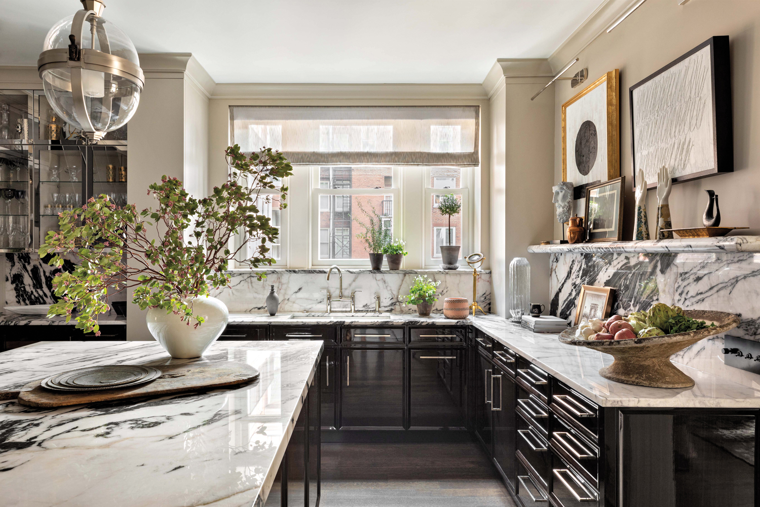 kitchen with high-gloss black cabinetry and white quartzite countertops in historic Chicago home