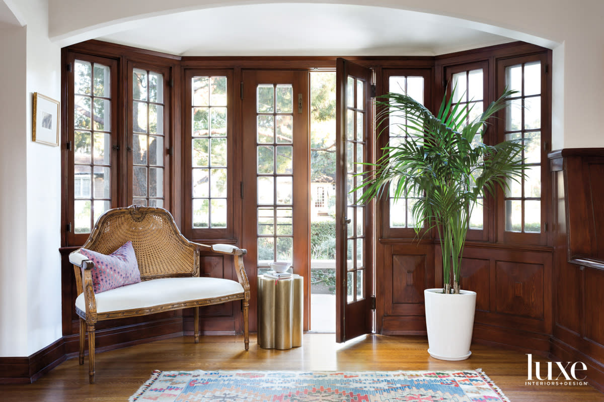 French doors with small settee beside