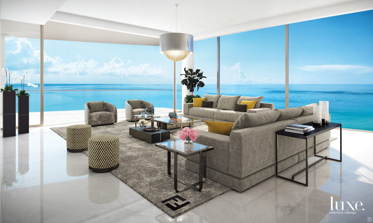 view of the ocean from living room with couches