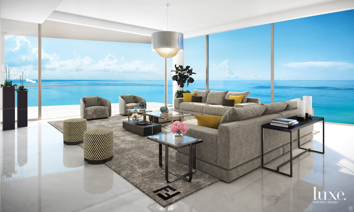 view of the ocean from living room with couches