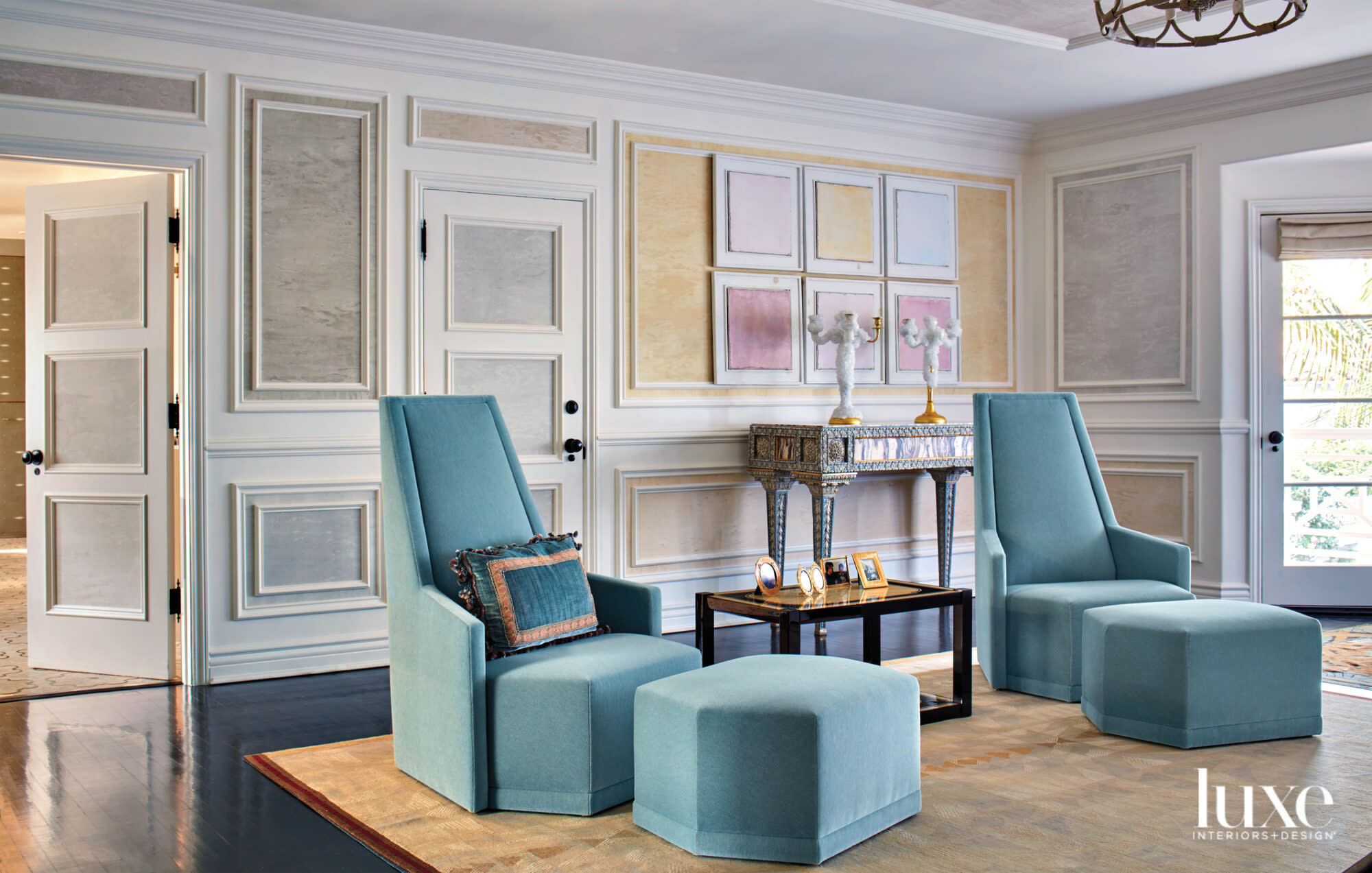 Main bedroom seating area with pair of chairs and textiles in panels