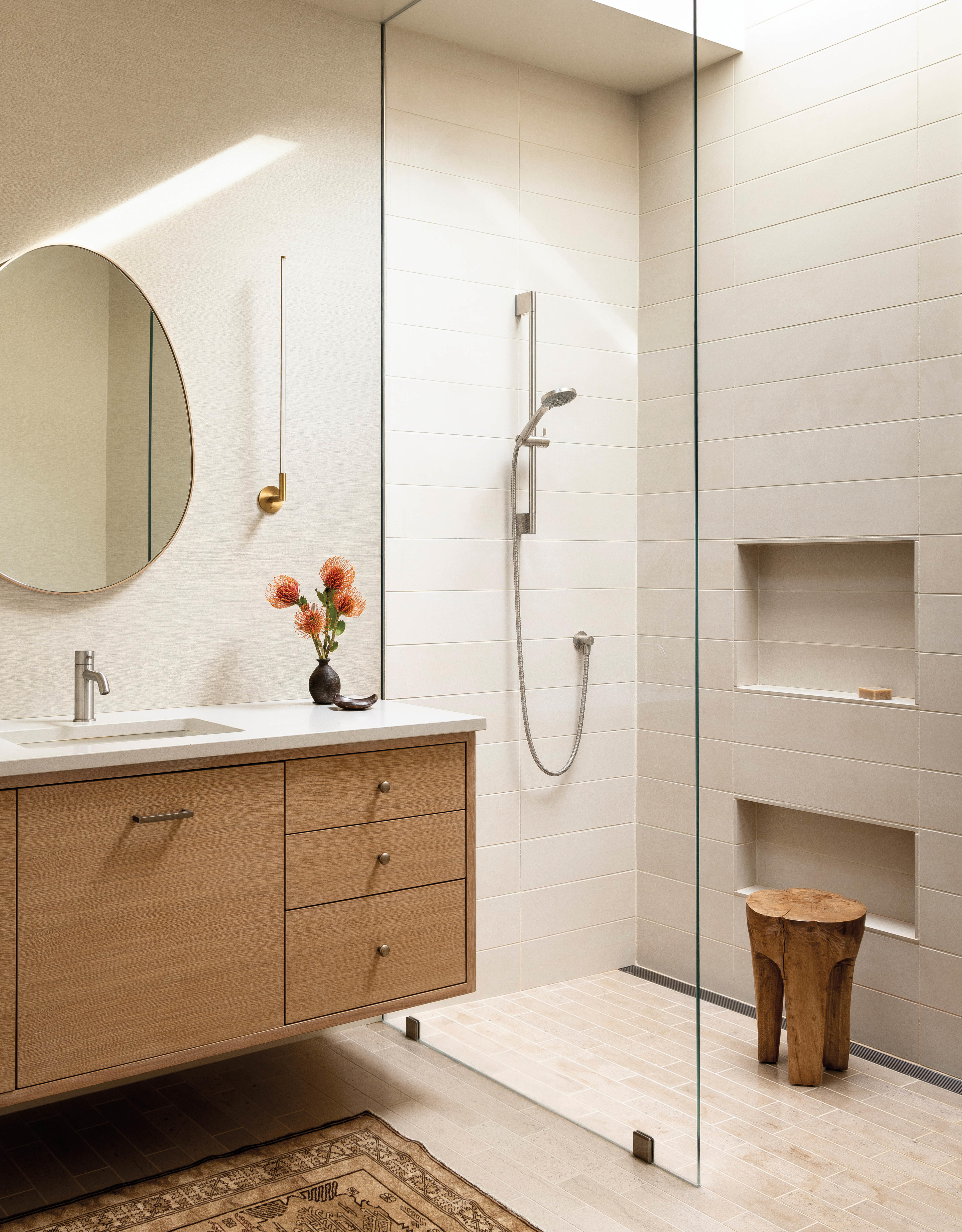 primary bath with rift-sawn white oak vanity and egg mirror