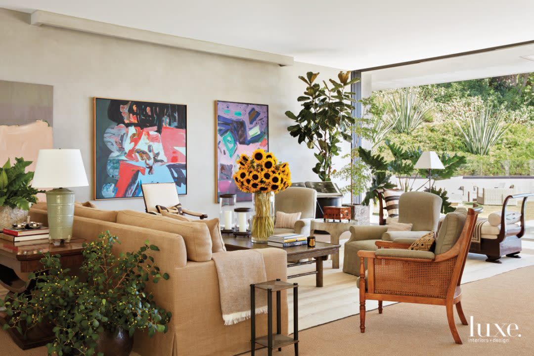 living room with syd soloman paintings