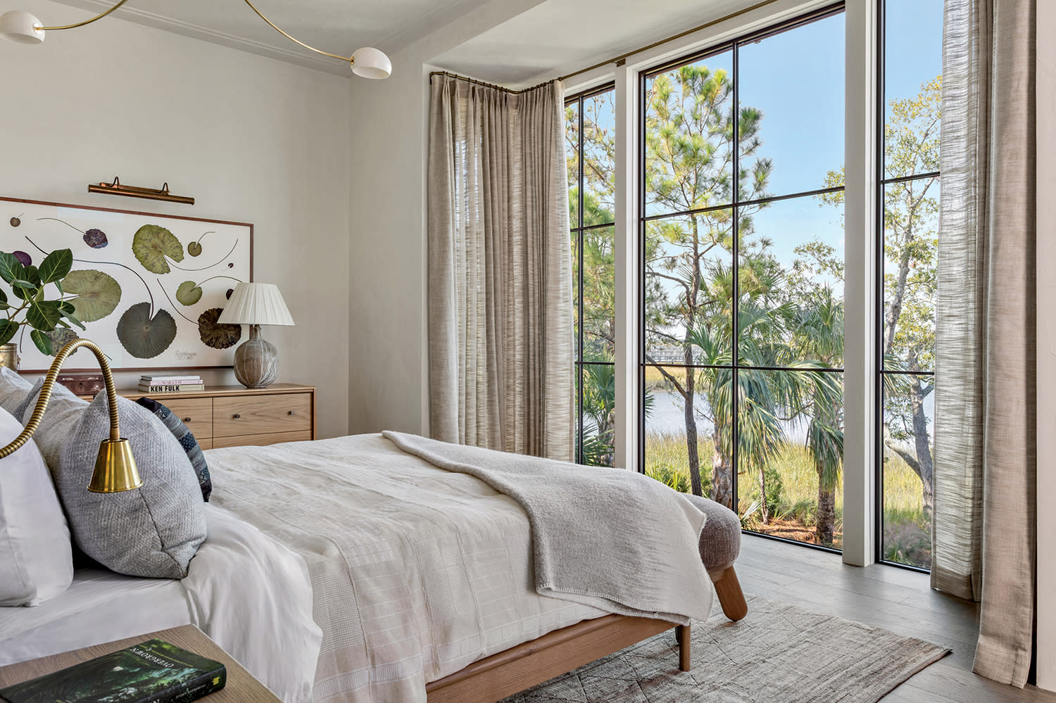 modern organic bedroom with floor-to-ceiling windows