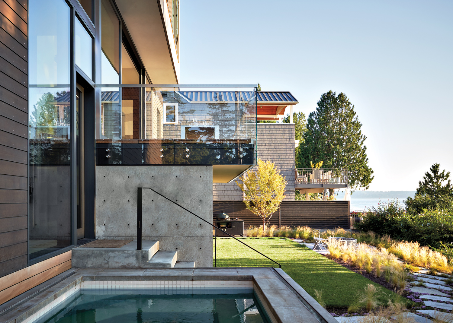 A back deck with a glass balcony