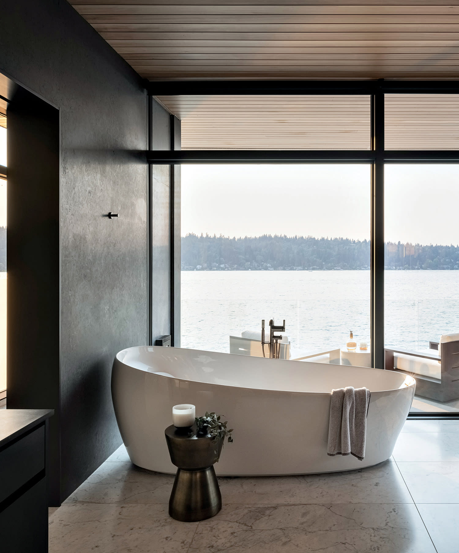 bathroom of a waterfront home with beautiful views from the tub