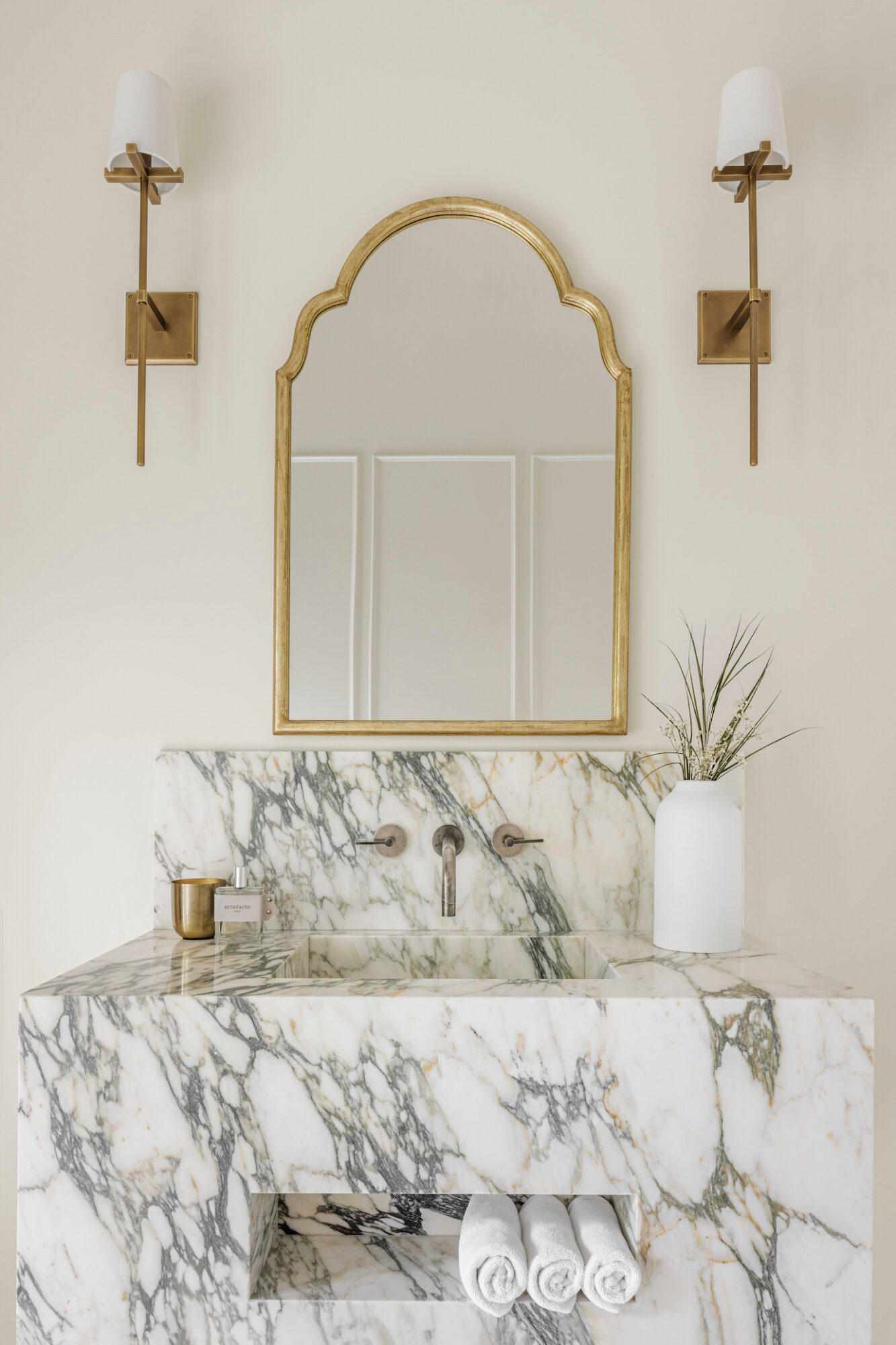 bathroom vanity featuring natural stone