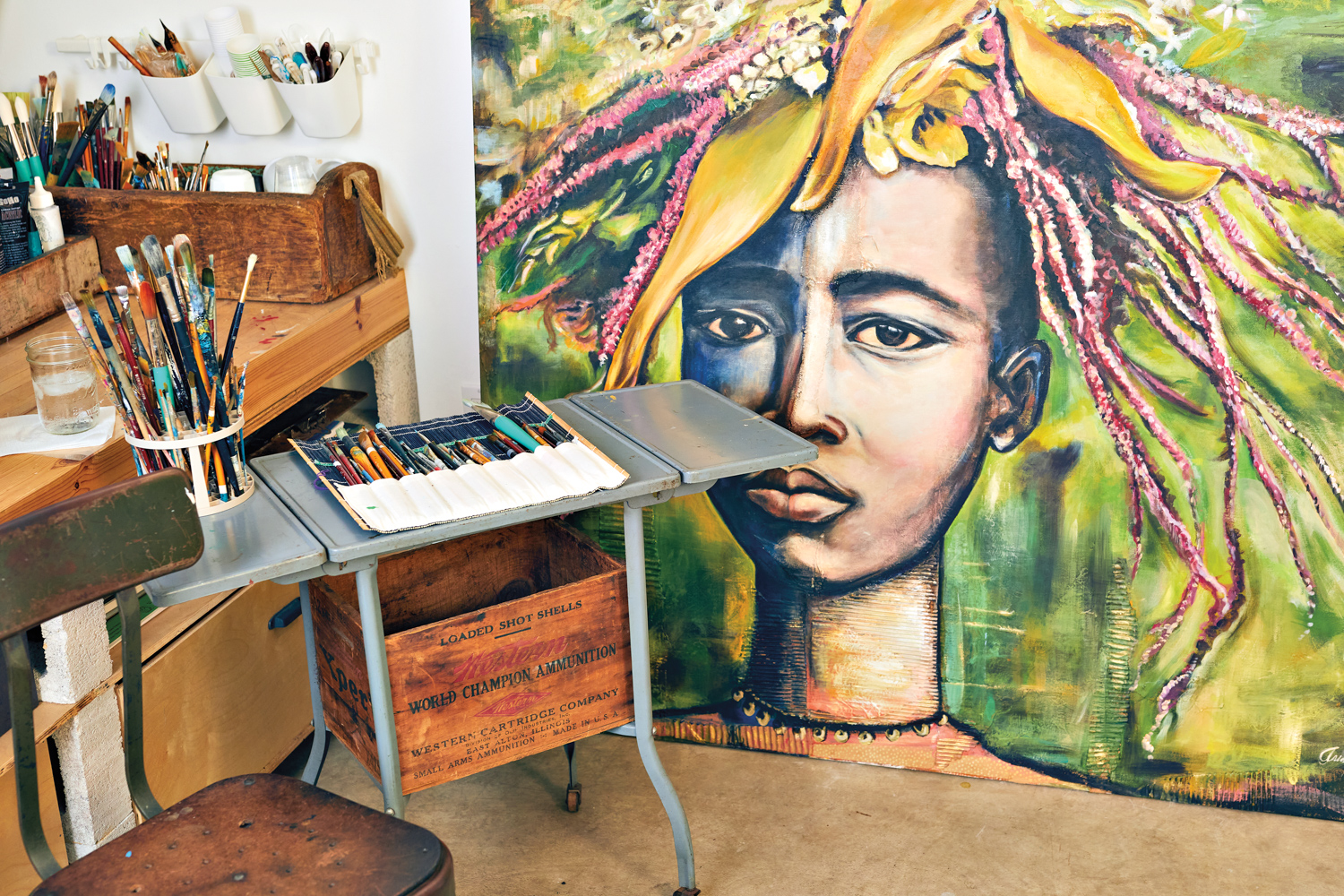 collaged portrait next to an art station