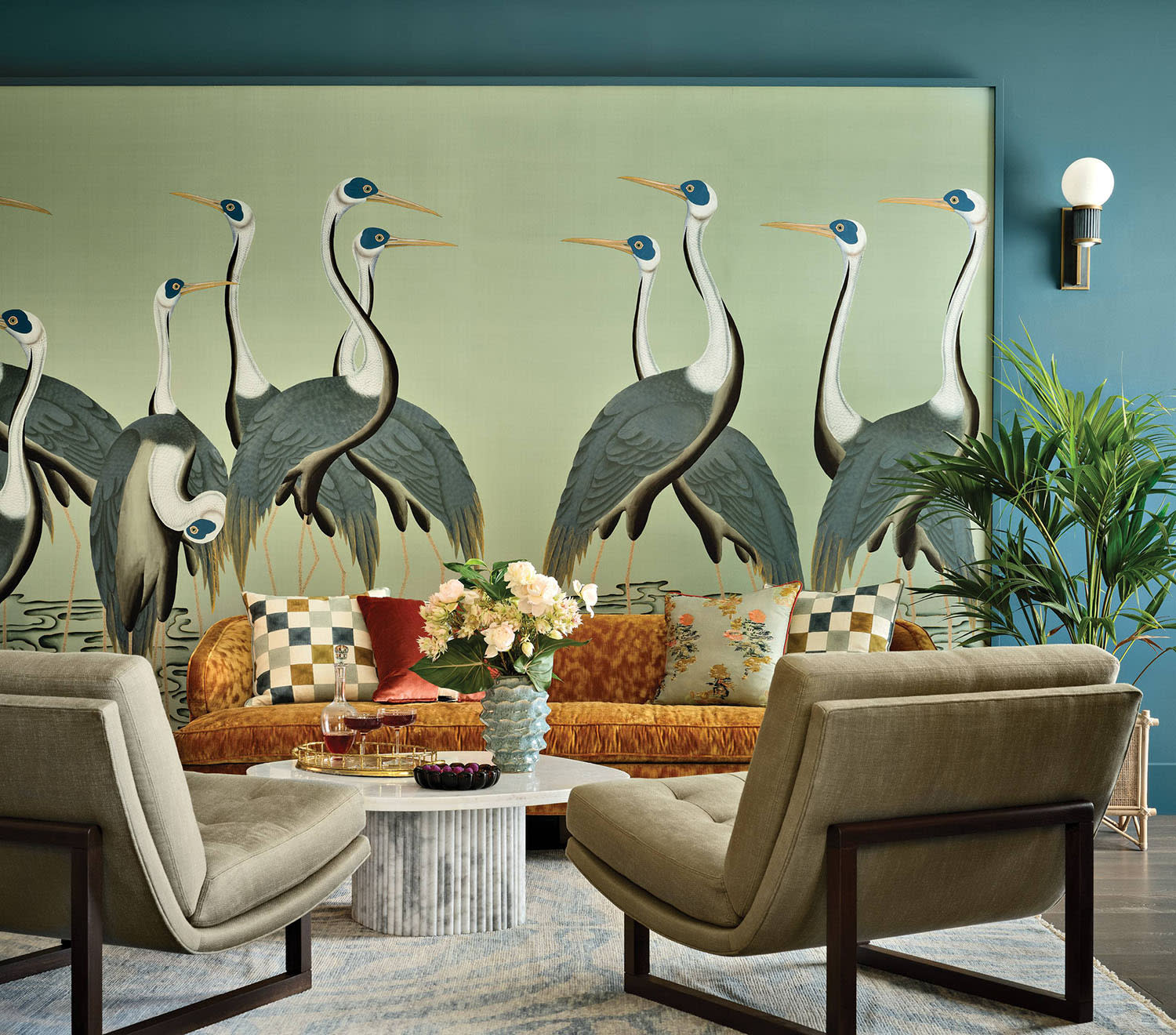 green living room with an aviary de Gournay wall mural