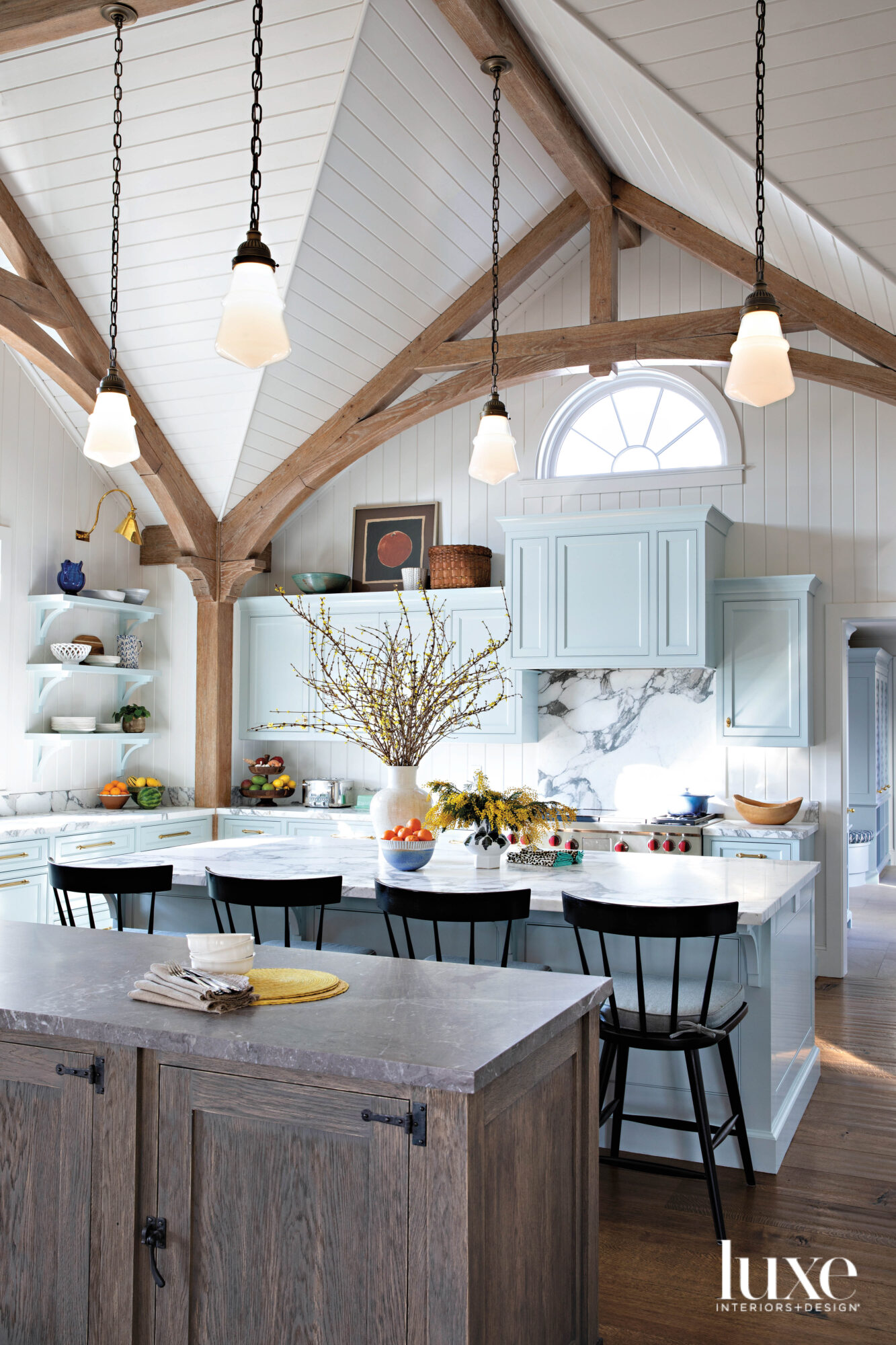 Kitchen with blue painted cabinets