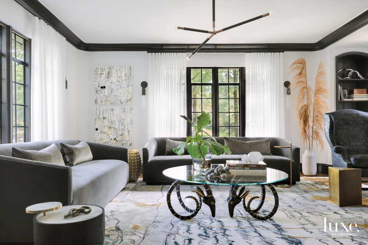 white living room abstract artwork and vintage furniture