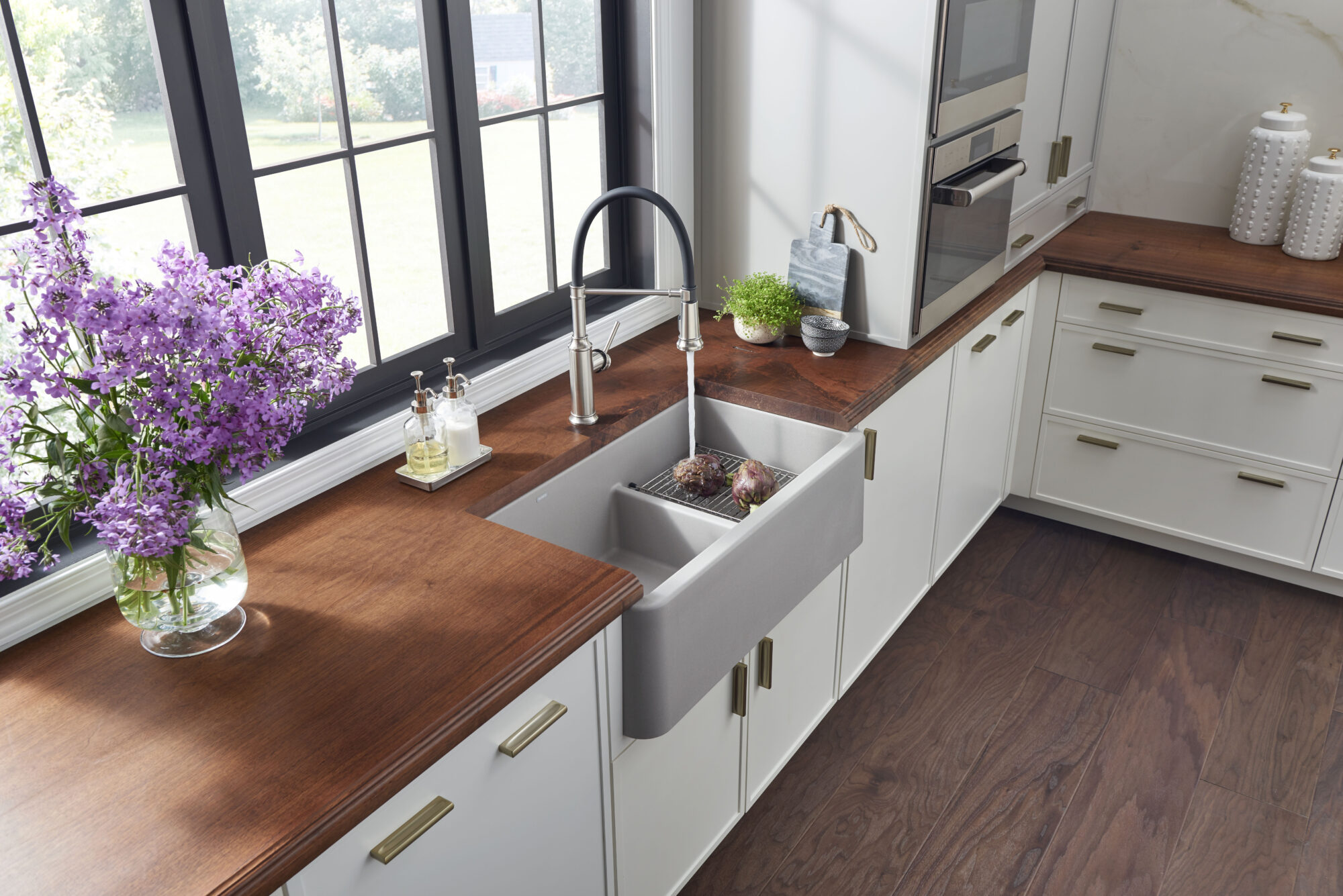 blanco grey sink with running water