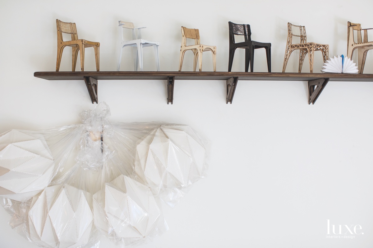 A close-up view of a light reveals the crisp craftsmanship of his designs.