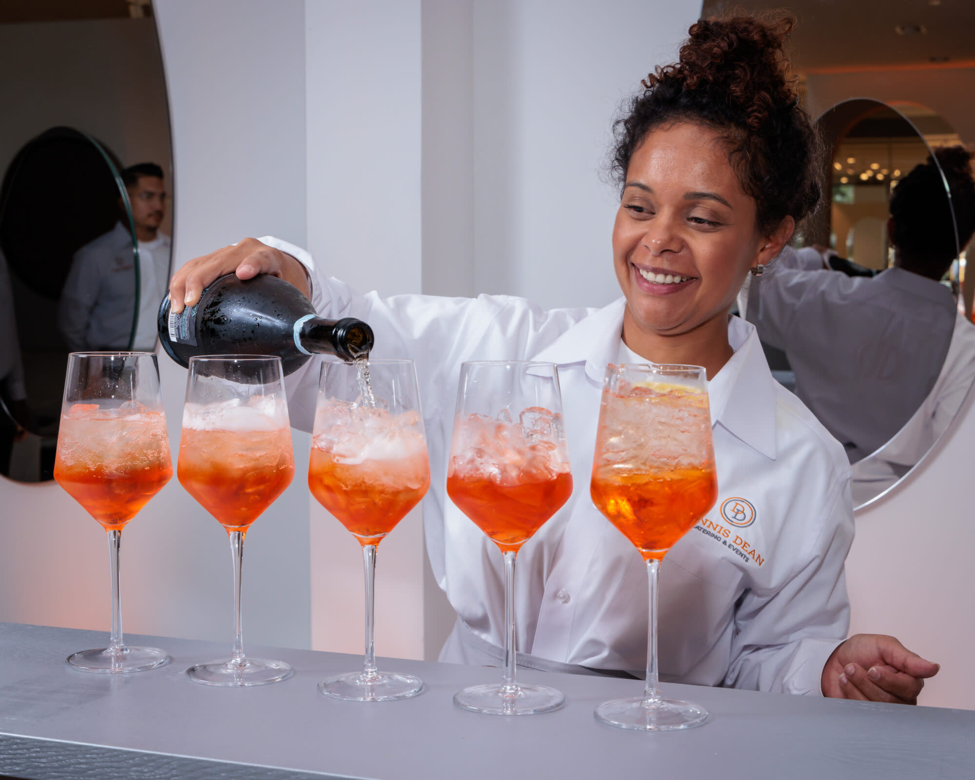 bartender pouring drinks