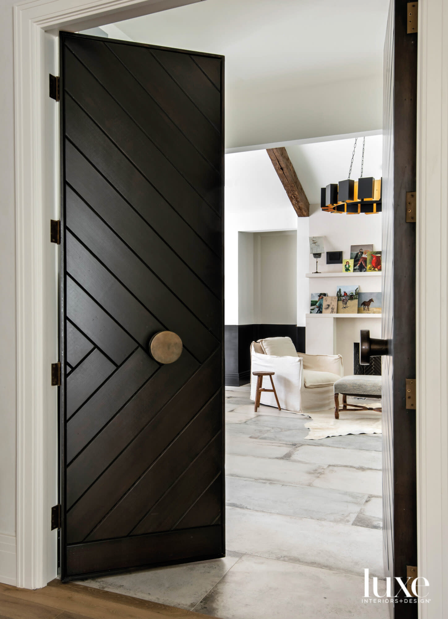 Herringbone patterned doors opening to an art studio