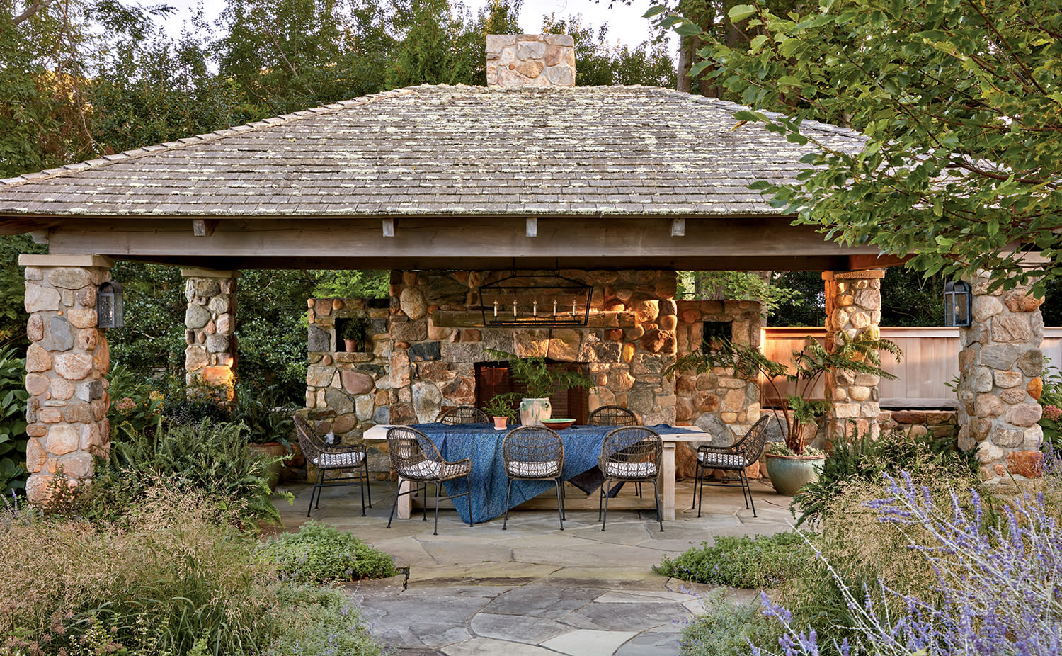 stone outbuilding with a covered dining terrace