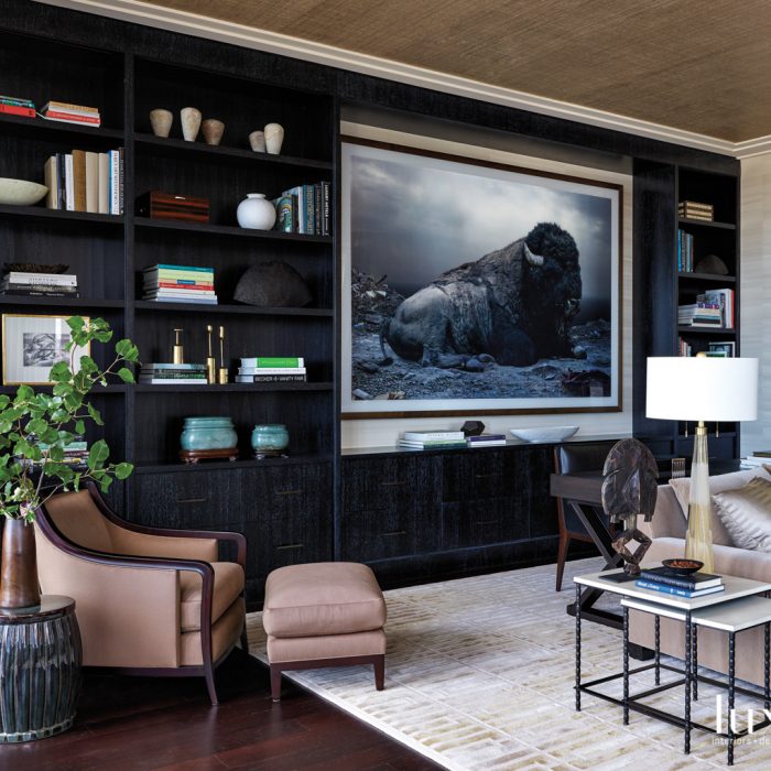 During the renovation the clients acquired a large Simen Johan digital chromogenic print of a buffalo, so the team incorporated it into the design of the living room millwork. "The piece brings a little bit of Texas to Michigan Avenue," remarks Craig.