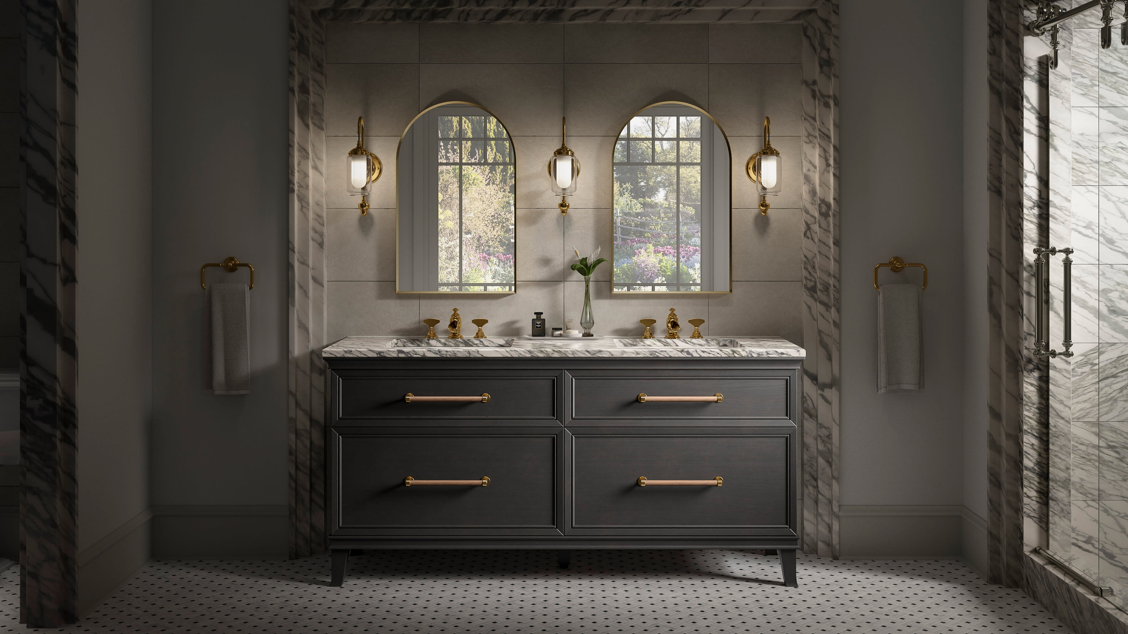 Elegant bathroom with a marble vanity, dual mirrors, and brass fixtures. Soft light from twin wall sconces creates a serene, luxurious atmosphere.