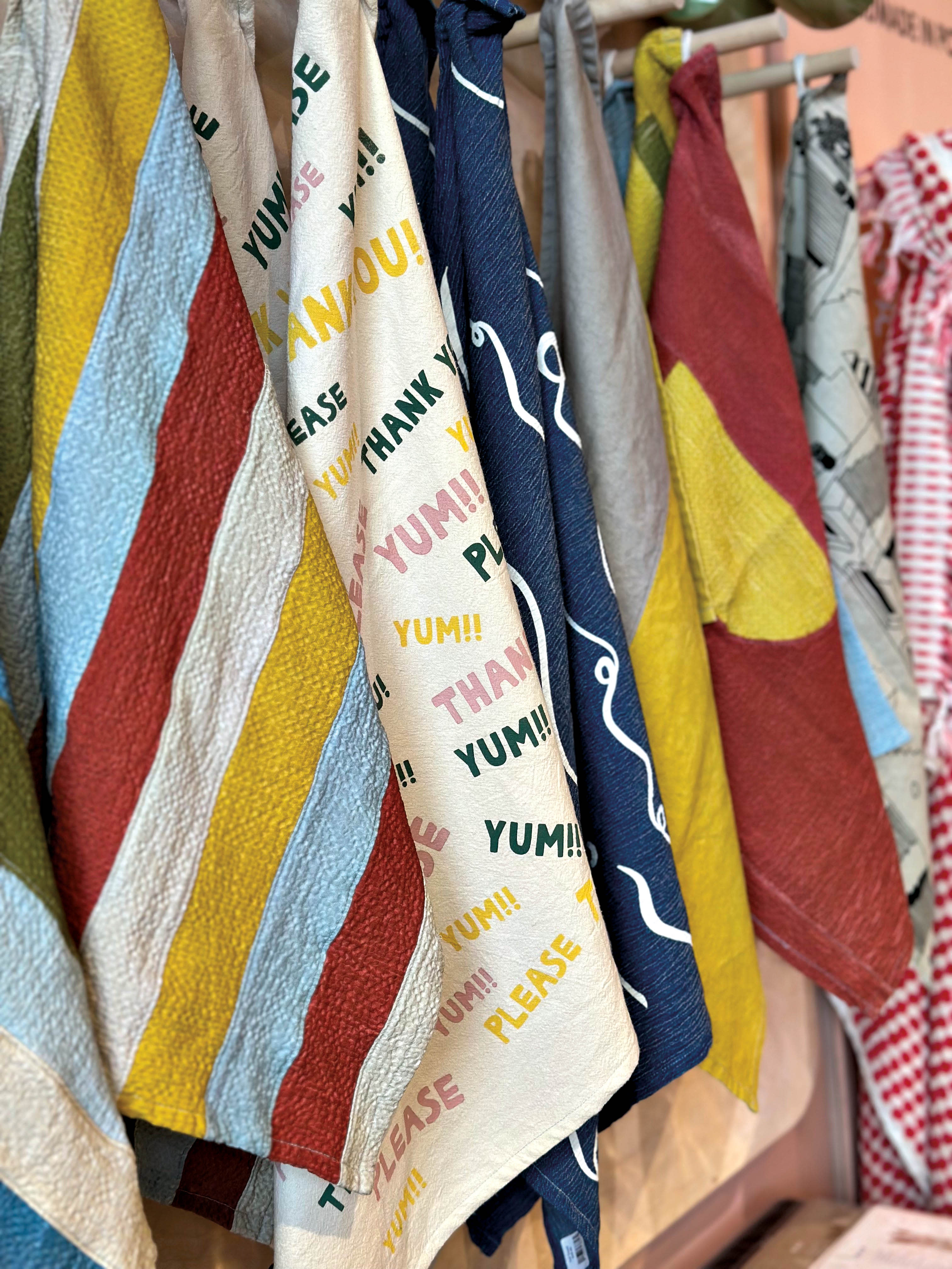 collection of colorful tea towels