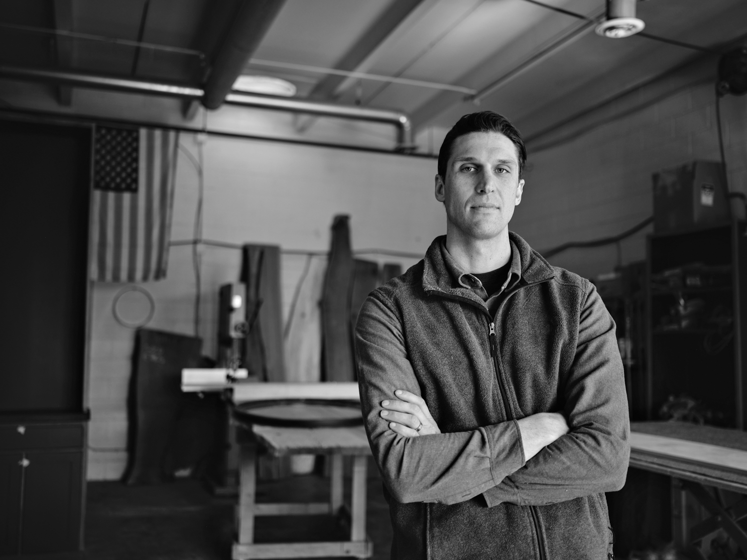 black and white portrait of Ross Beard in his studio