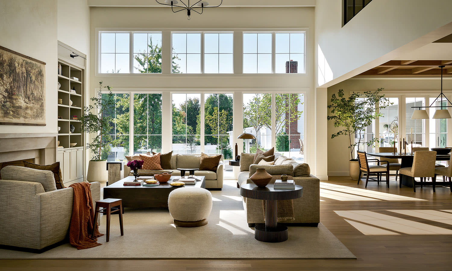 A bright living room showcasing a prominent fireplace, enhancing the room's comfort and aesthetic appeal.