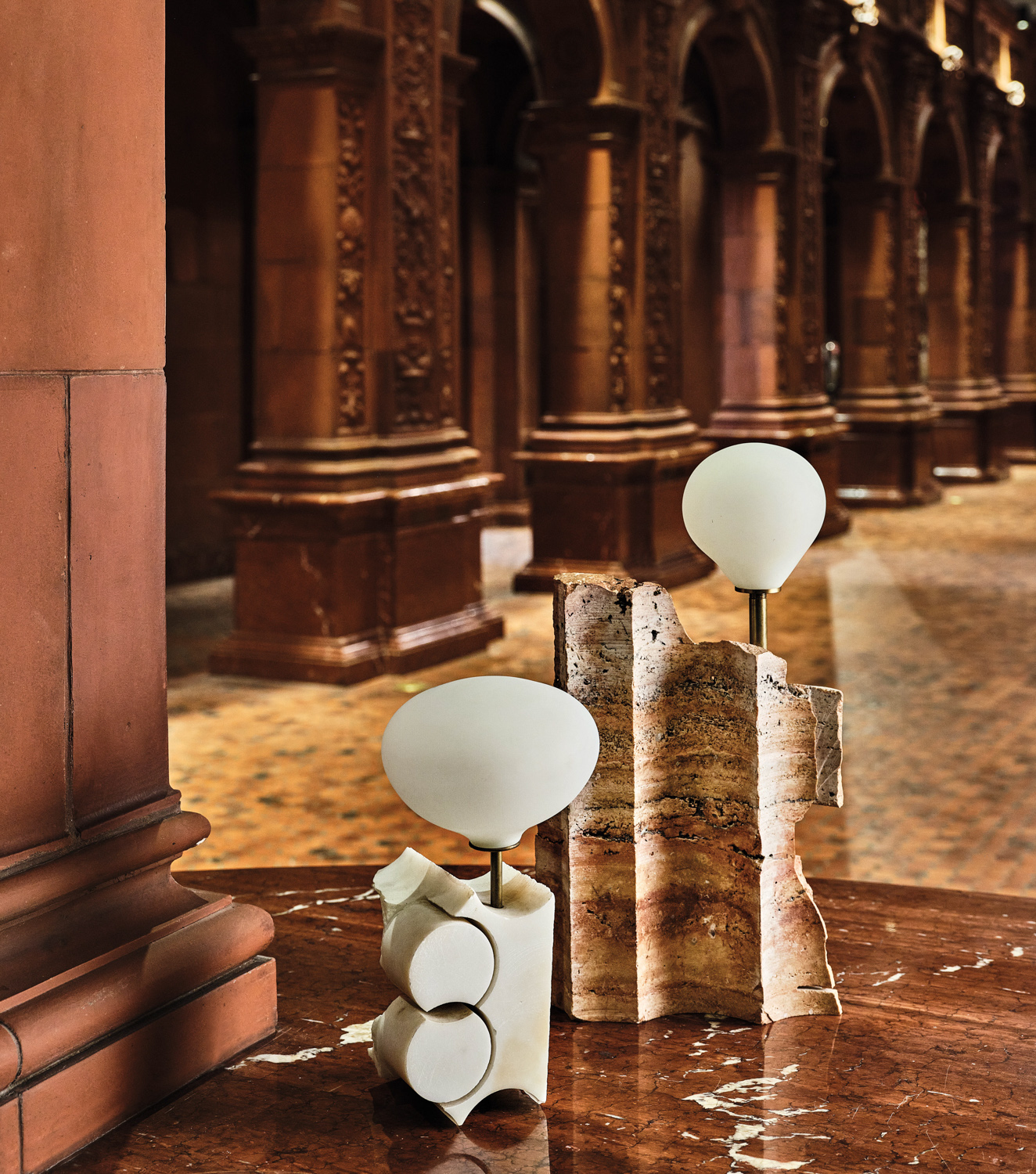 white lamp fixtures on table at the Hispanic Society Museum & Library