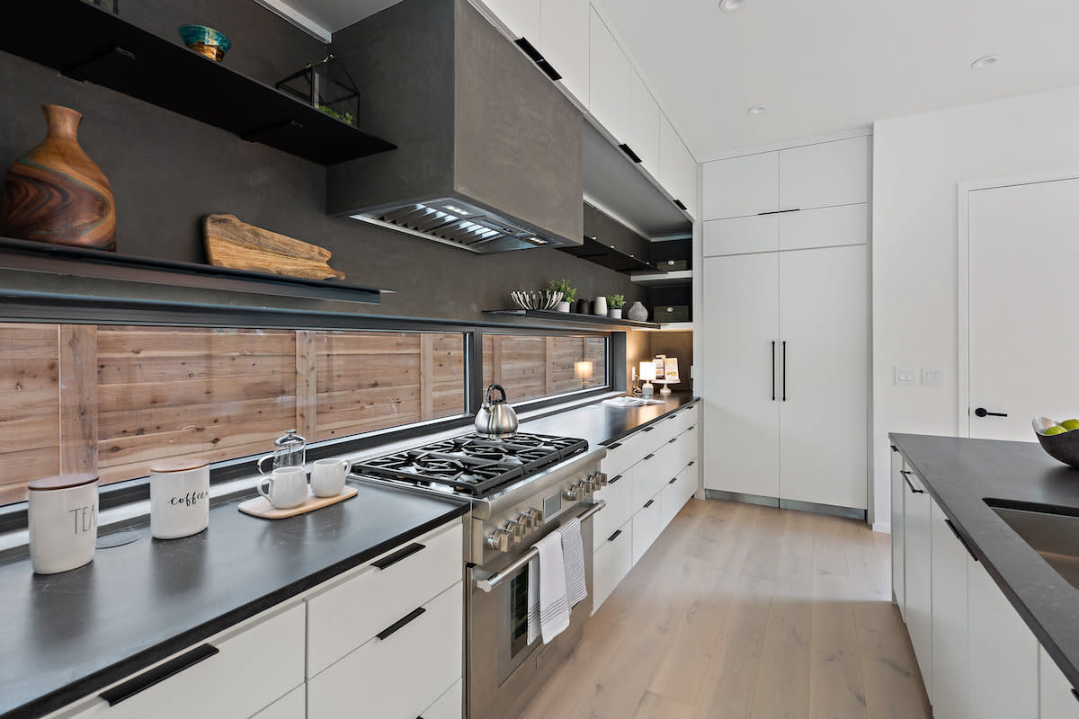 Image of a contemporary kitchen with a stainless steel stove.